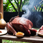 **
"Close-up of various raw meat cuts (beef brisket, lamb shoulder, duck, whole chicken) and a selection of Malaysian smoking woods (rambutan, rubber, mangrove, tamarind) arranged in a rustic, traditional outdoor smoking setup. Soft smoke subtly rises in the background. Emphasize rich textures, natural light, and an inviting, authentic atmosphere."

**